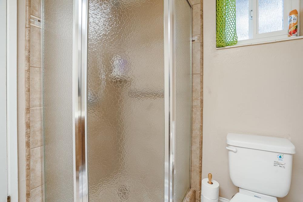 140 Rays Circle Hollister, CA 95023 - Photo 18 of 31 a bathroom with a toilet and a shower