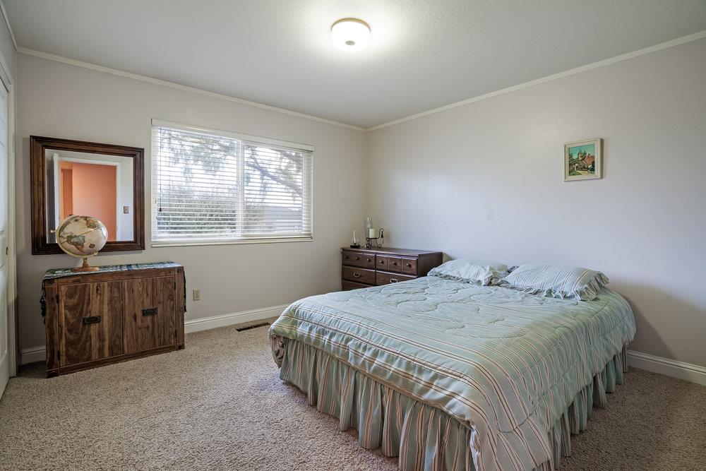 140 Rays Circle Hollister, CA 95023 - Photo 19 of 31 a bedroom with a bed and a dresser