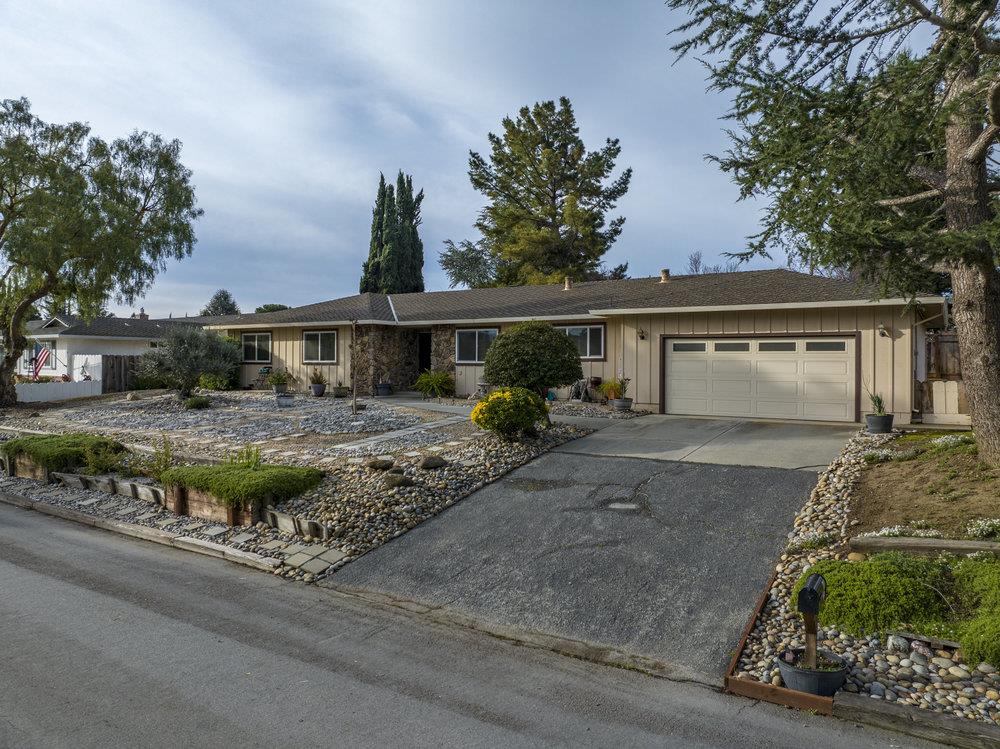 140 Rays Circle Hollister, CA 95023 - Photo 2 of 31 a front view of a house with garden