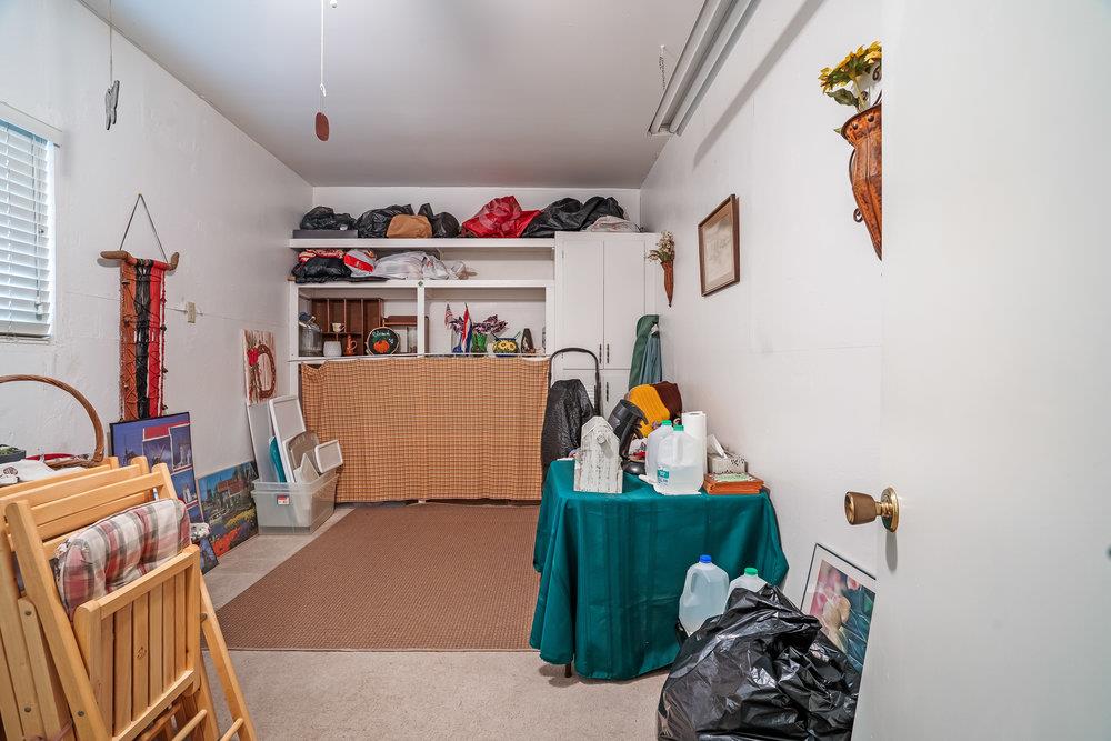 140 Rays Circle Hollister, CA 95023 - Photo 23 of 31 a living room with furniture and a flat screen tv