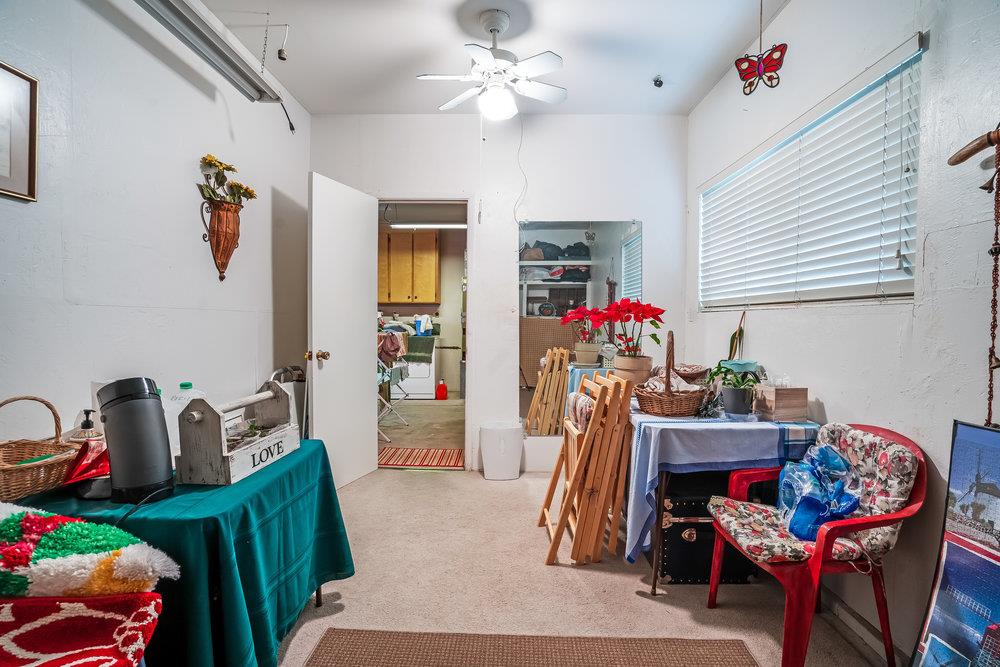 140 Rays Circle Hollister, CA 95023 - Photo 24 of 31 a living room with furniture and a chandelier