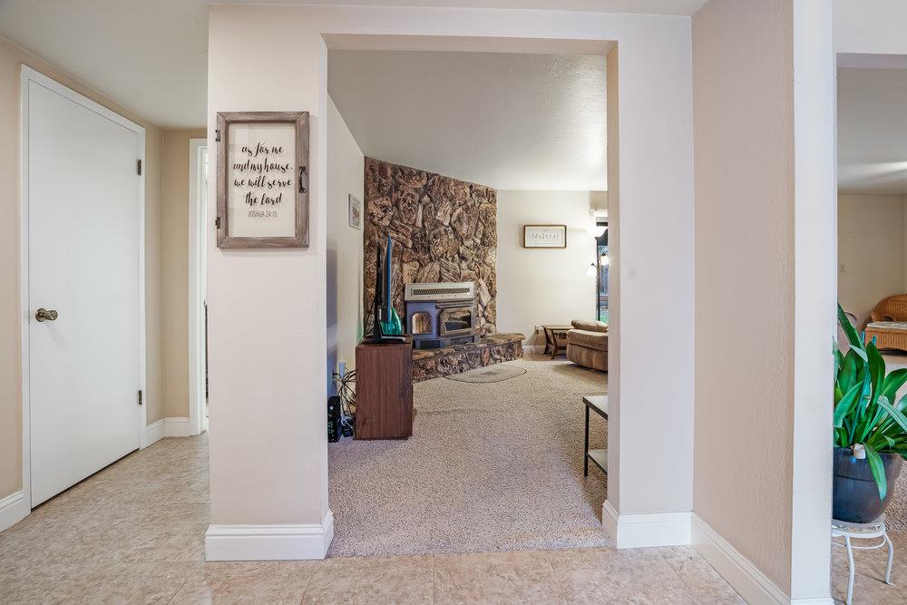 140 Rays Circle Hollister, CA 95023 - Photo 5 of 31 a view of a livingroom with workspace and a couch