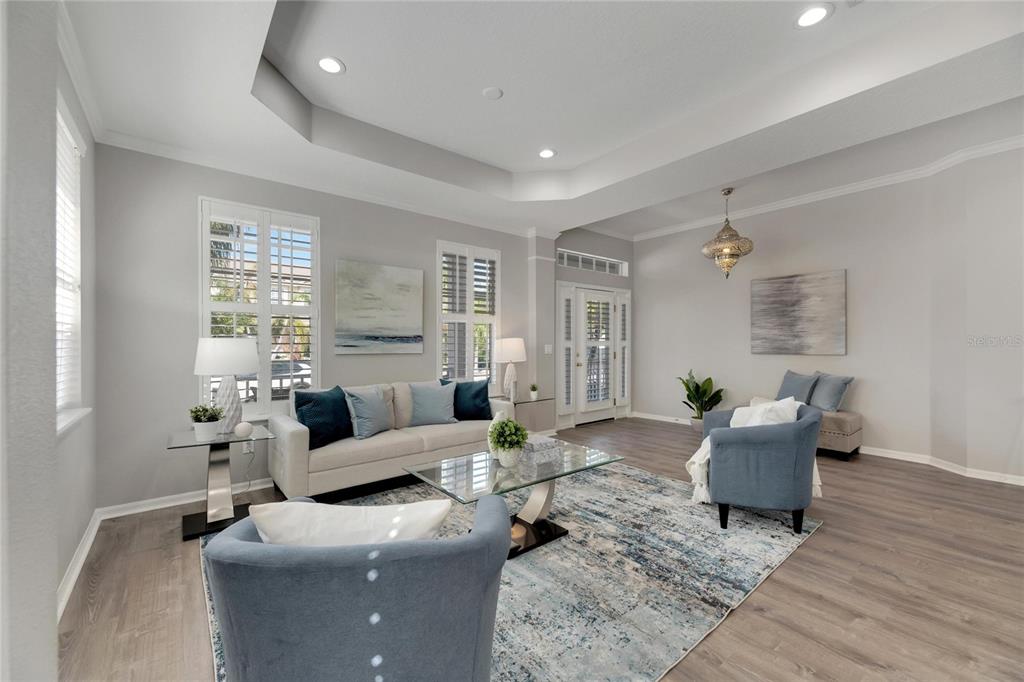 528 Islebay Drive Apollo Beach, FL 33572 - Photo 13 of 98 a living room with furniture and wooden floor