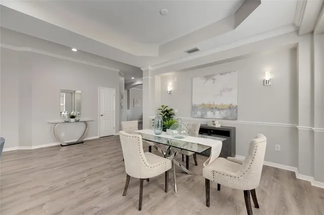 a view of a dining room with furniture