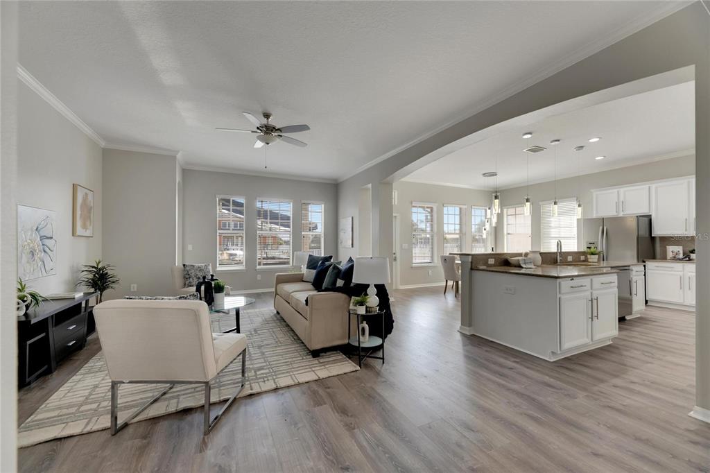 528 Islebay Drive Apollo Beach, FL 33572 - Photo 16 of 98 a living room with furniture and wooden floor