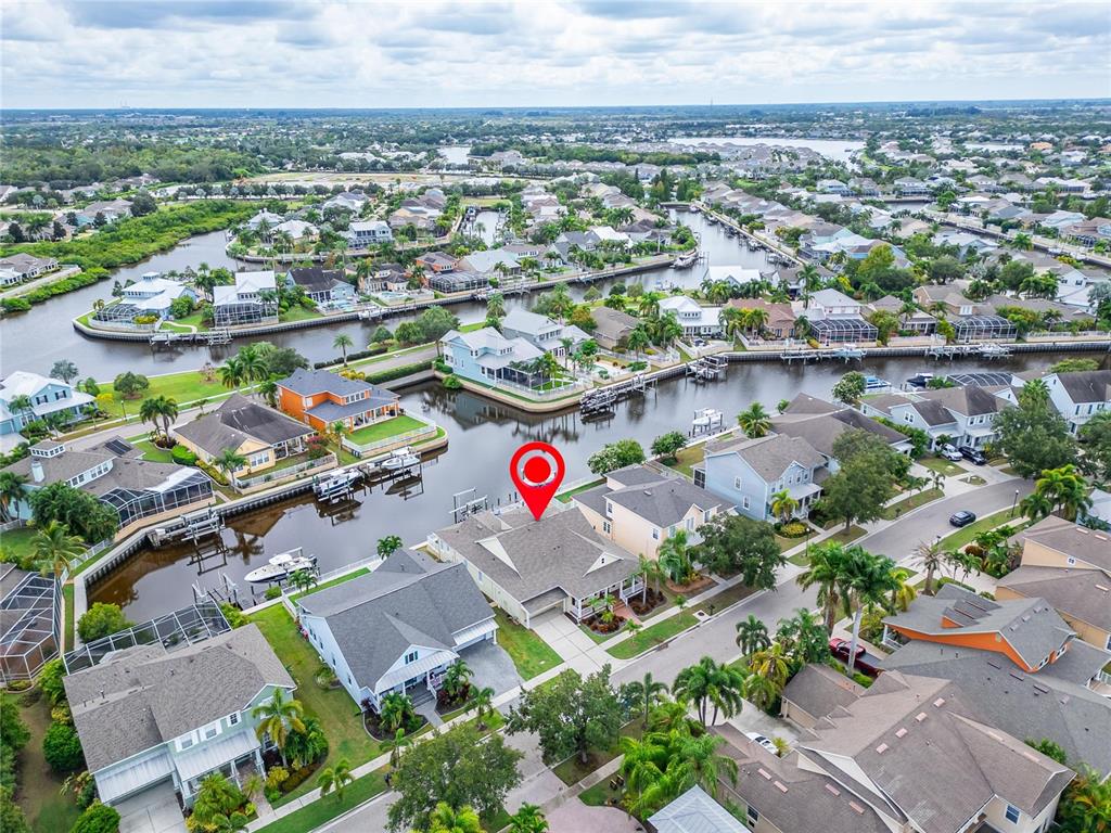 528 Islebay Drive Apollo Beach, FL 33572 - Photo 3 of 98 an aerial view of residential houses with outdoor space