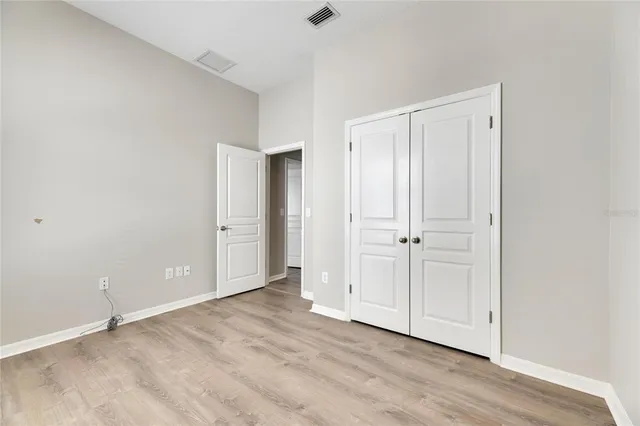 a view of a living room and a floor to ceiling window