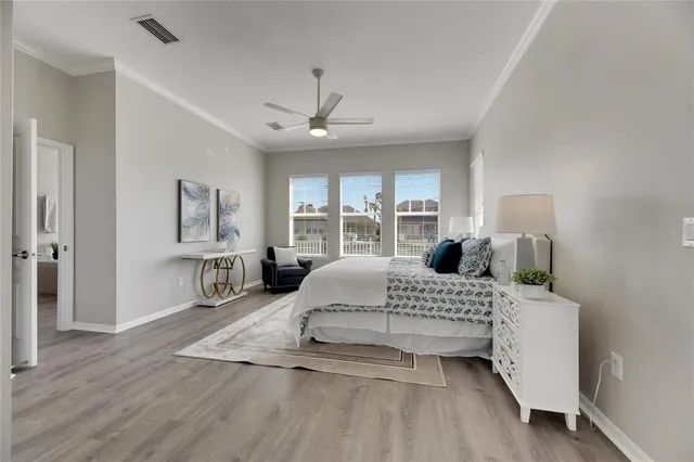 an aerial view of a house with swimming pool outdoor seating and yard
