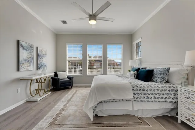 a view of a lake with a table and chairs