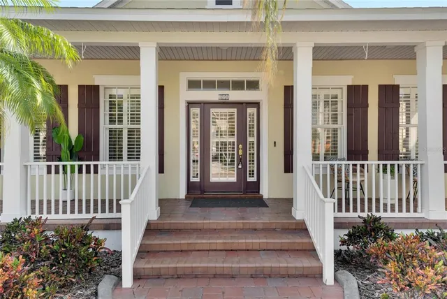 a living room with furniture and windows