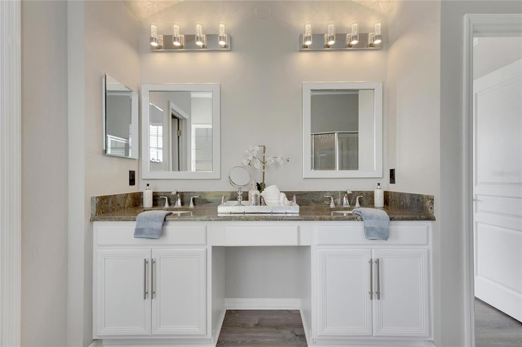 528 Islebay Drive Apollo Beach, FL 33572 - Photo 52 of 98 a bathroom with a sink vanity and mirror