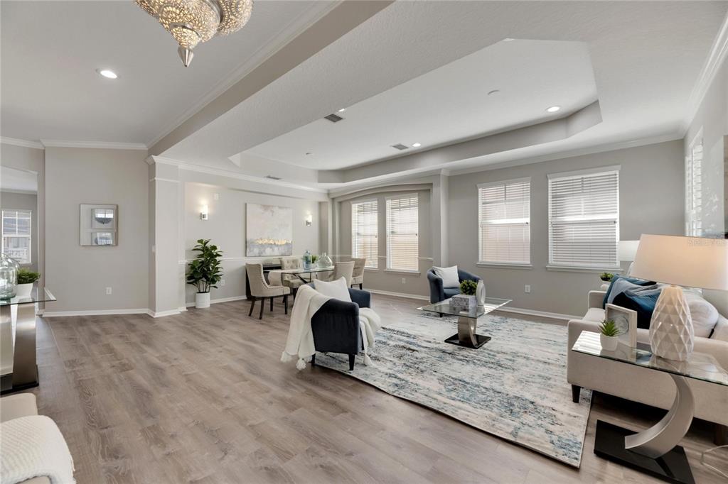 528 Islebay Drive Apollo Beach, FL 33572 - Photo 8 of 98 a living room with furniture and wooden floor