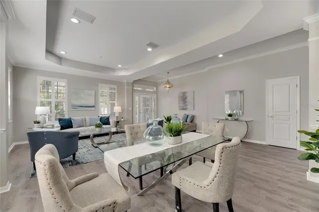 a view of a livingroom with furniture and a window