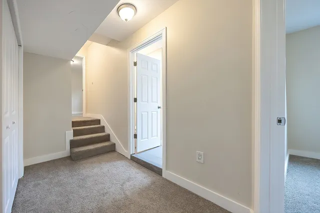 a view of entryway with stairs