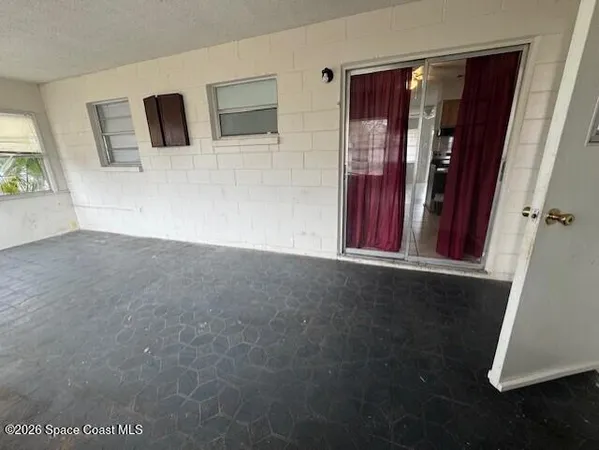 an empty room with windows
