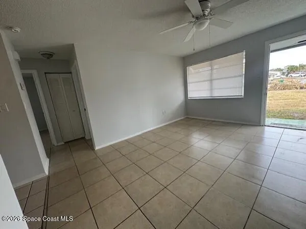 an empty room with windows