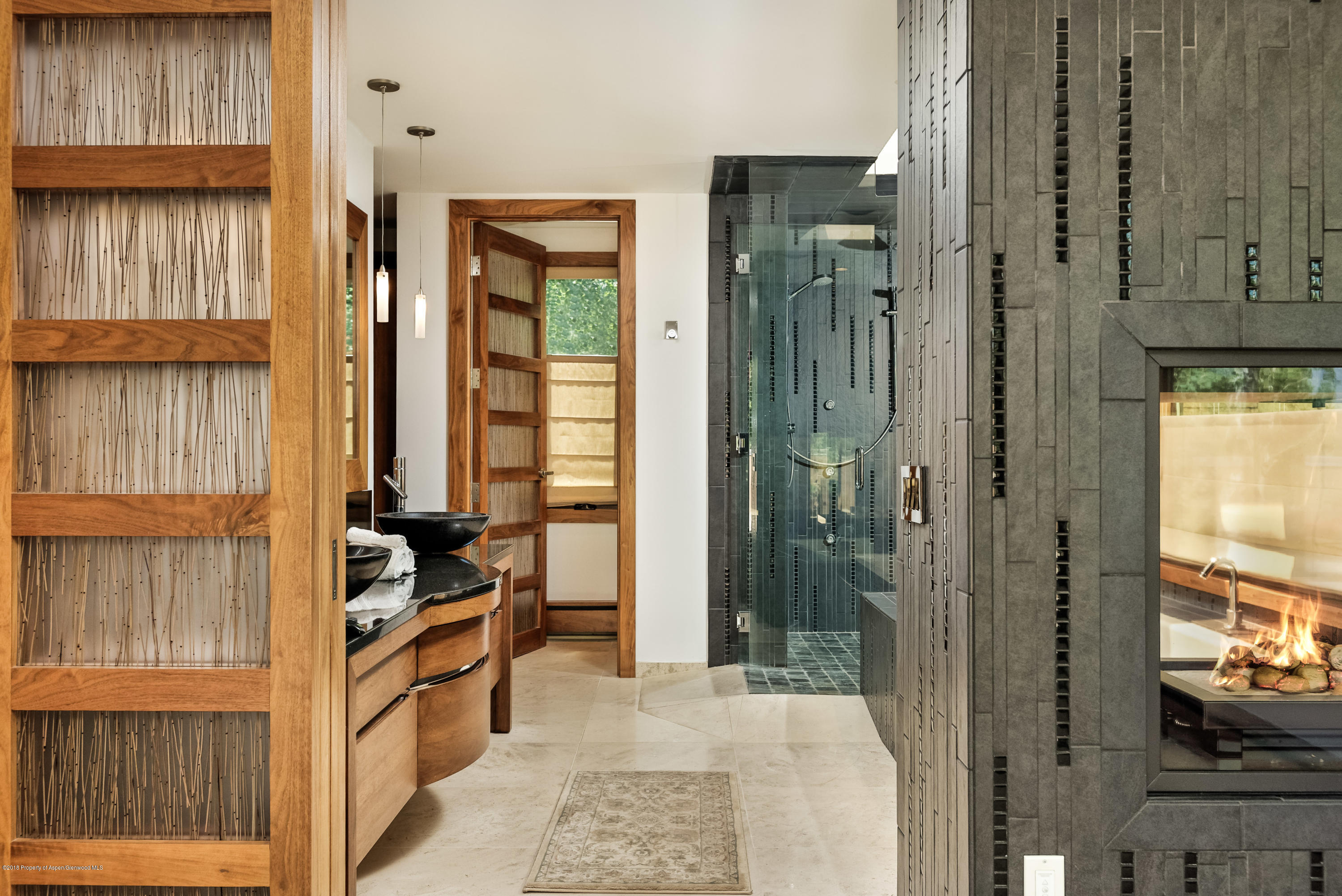 406 Ridge Road Snowmass Village, CO 81615 - Photo 9 of 41 Master bath with fireplace