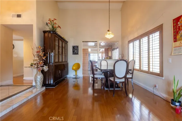 a view of a livingroom with furniture and a swimming pool