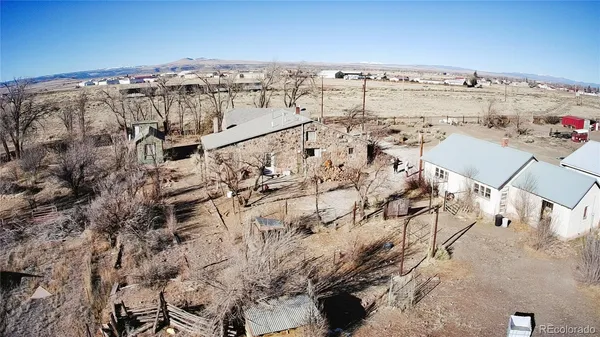 a view of backyard with wooden deck
