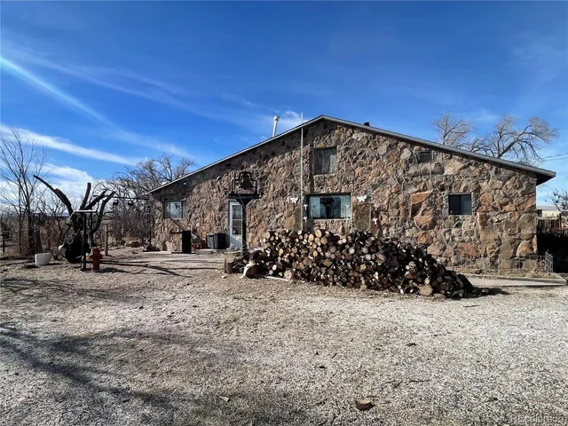a view of a house with a snow