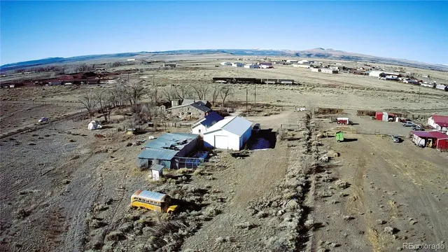 an aerial view of a beach with ocean view