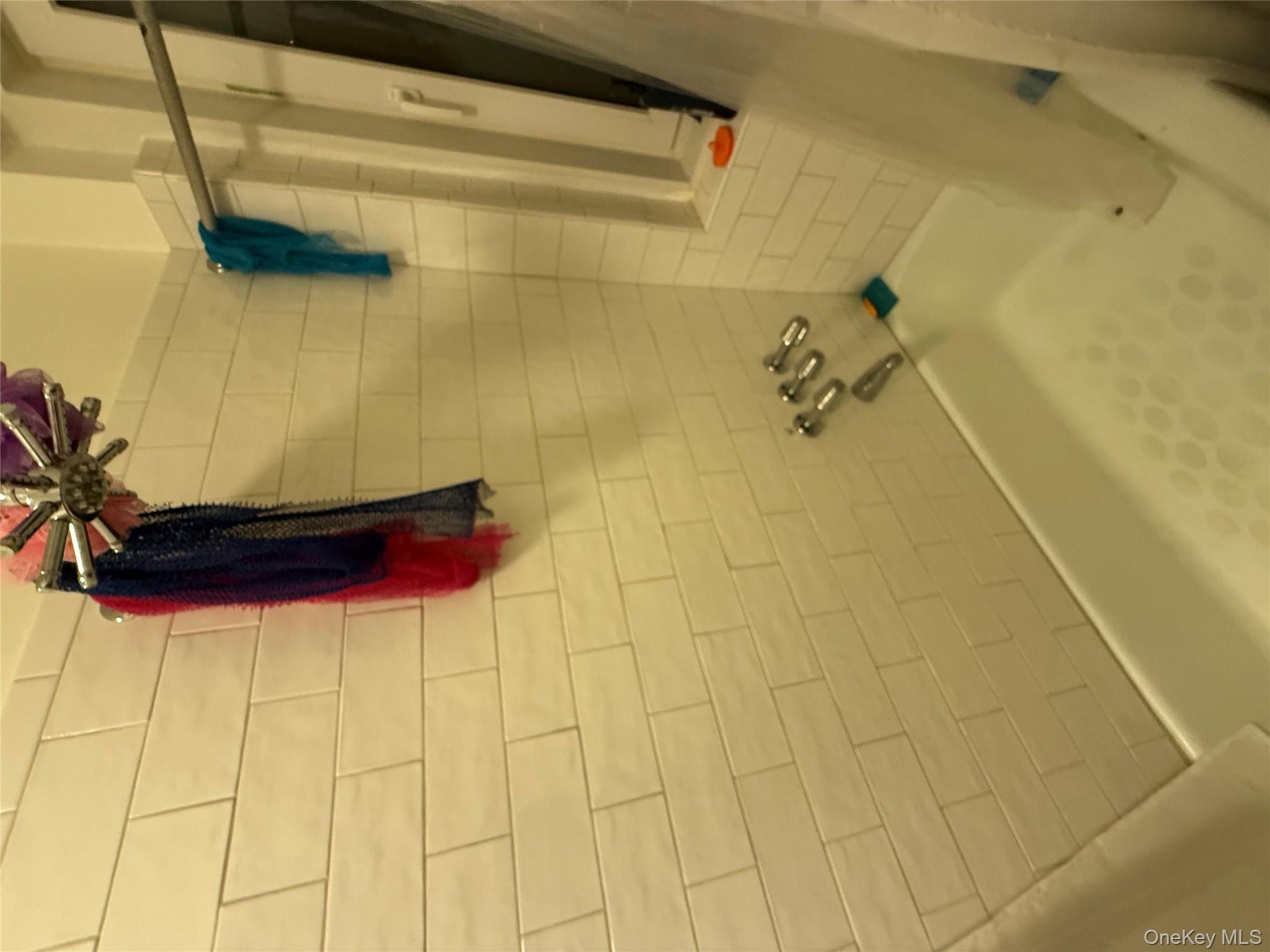 950 Hoe Avenue, Unit 4D Bronx, NY 10459 - Photo 8 of 8 a bathroom with a bathtub