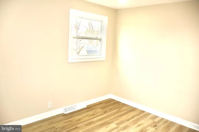 a view of a room next to a window