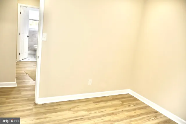 a picture of a room with a large window