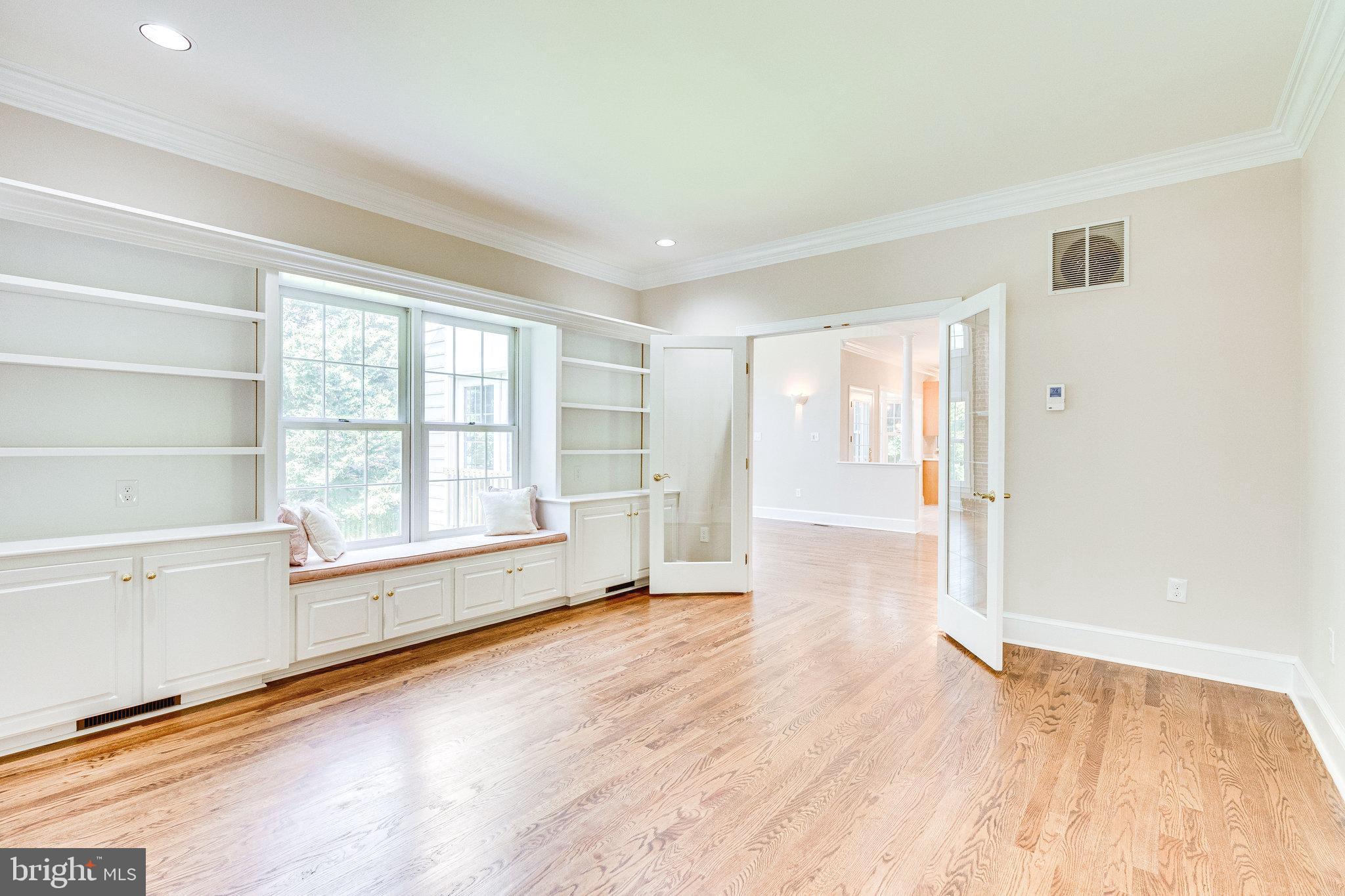 1504 Laughlin Avenue McLean, VA 22101 - Photo 9 of 43 Library with built-ins and a reading bench.