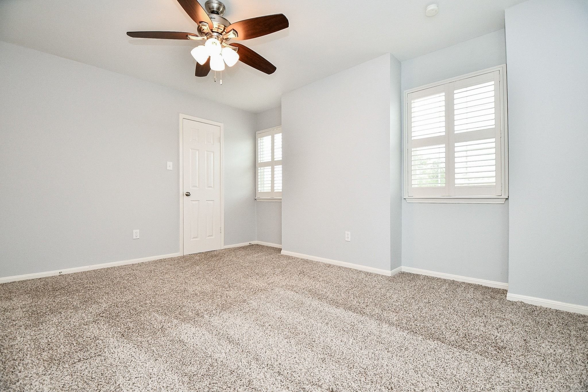 14011 Wickersham Lane Houston, TX 77077 - Photo 34 of 38 One of three spacious, secondary bedrooms.