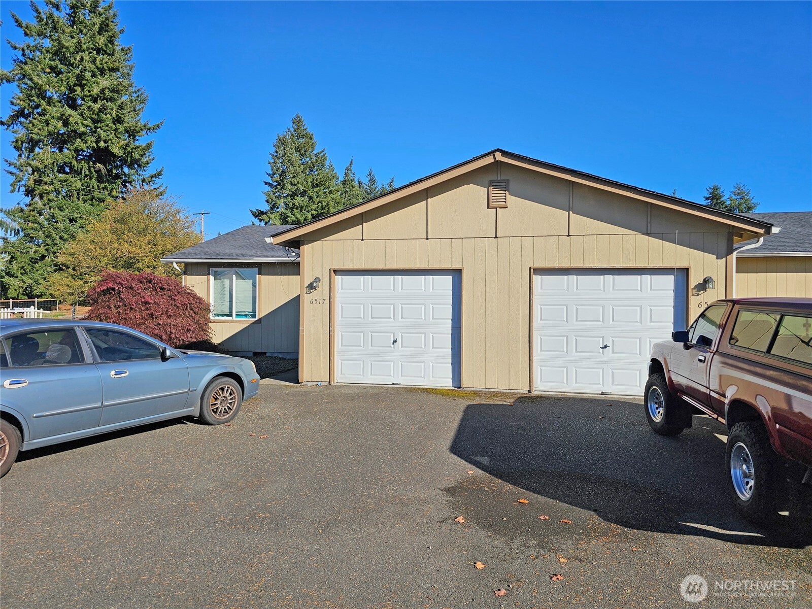 6521 201st Avenue Southwest Centralia, WA 98531 - Photo 6 of 16 a view of a car parked in front of a house