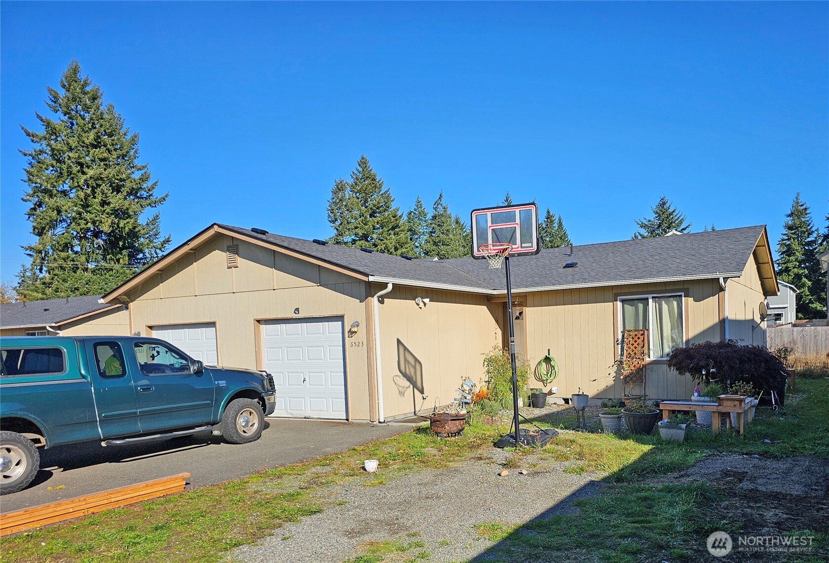6521 201st Avenue Southwest Centralia, WA 98531 - Photo 7 of 16 a view of a house with a yard