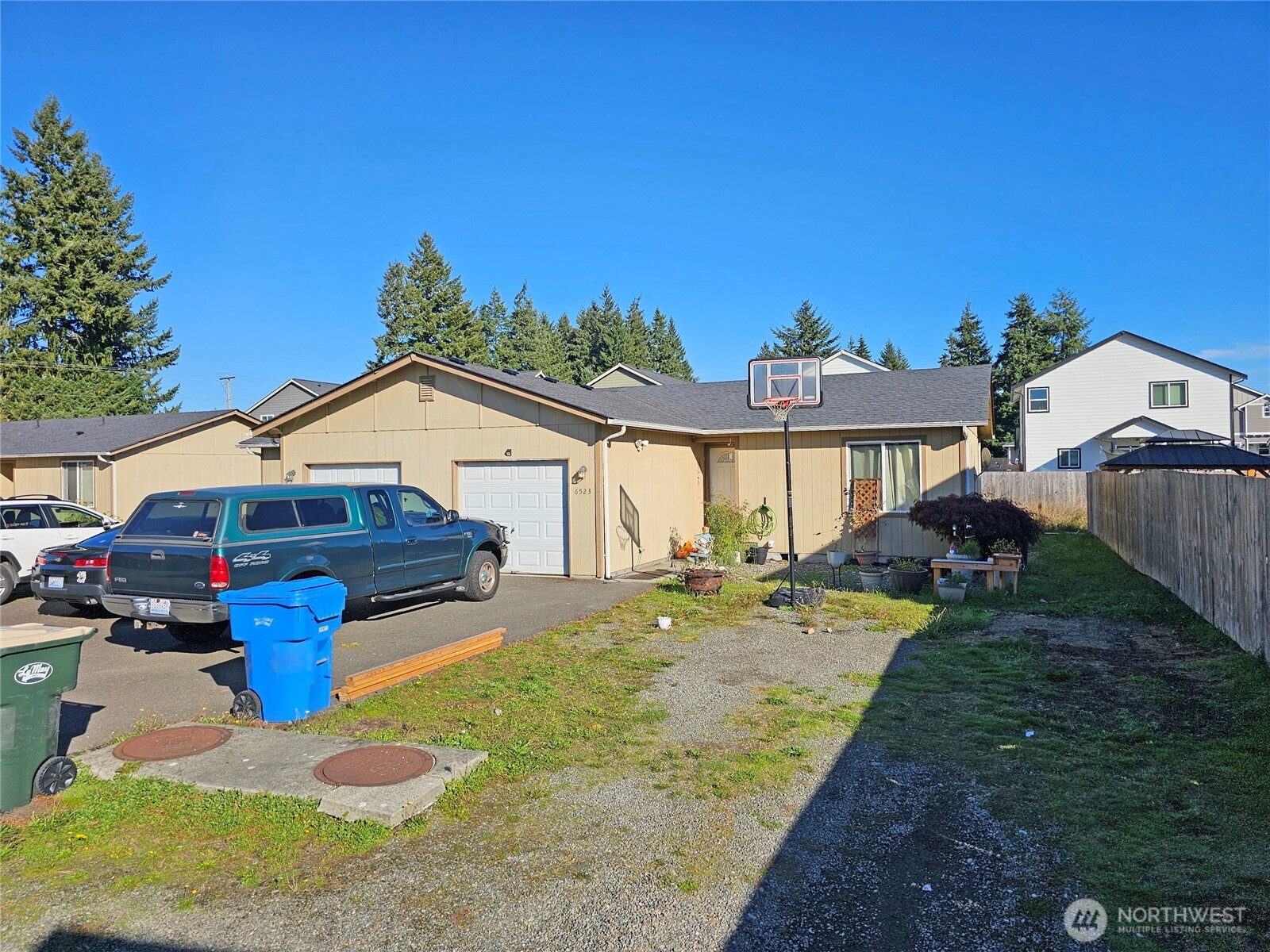 6521 201st Avenue Southwest Centralia, WA 98531 - Photo 8 of 16 a view of a house with backyard and sitting area