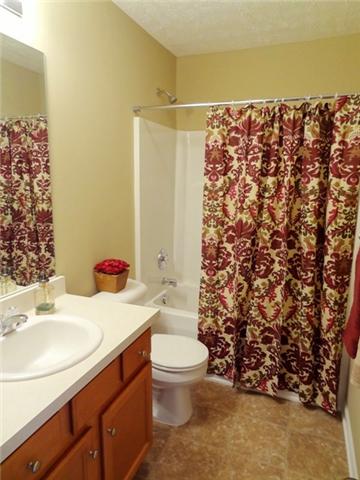 3936 Stephens Ridge Way Antioch, TN 37013 - Photo 8 of 18 a bathroom with a sink toilet and shower