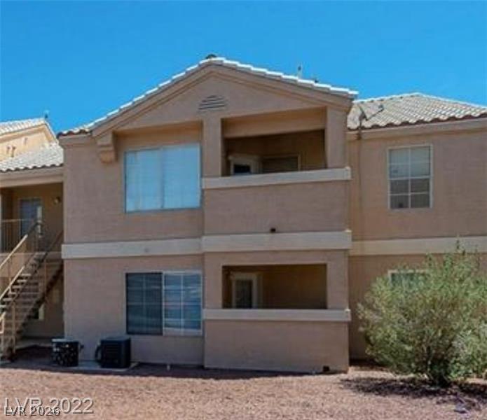 1830 North Pecos Road, Unit 142 Las Vegas, NV 89115 - Photo 1 of 19 Multi-level living spaces offer private balconies and convenient exterior access.