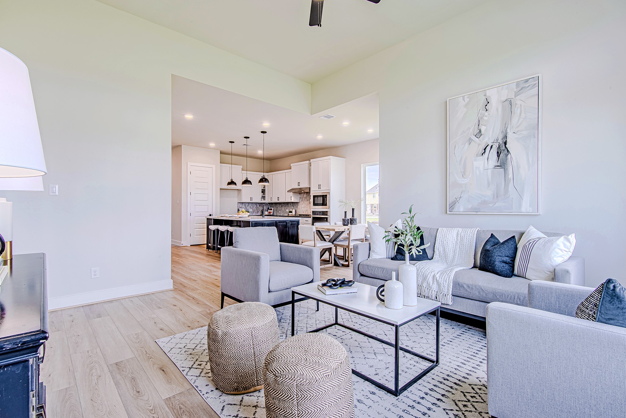 141 Peninsula Point Drive Montgomery, TX 77356 - Photo 17 of 47 A seamless open layout connects the living room to the kitchen and dining area, making this space perfect for everyday comfort and effortless entertaining.