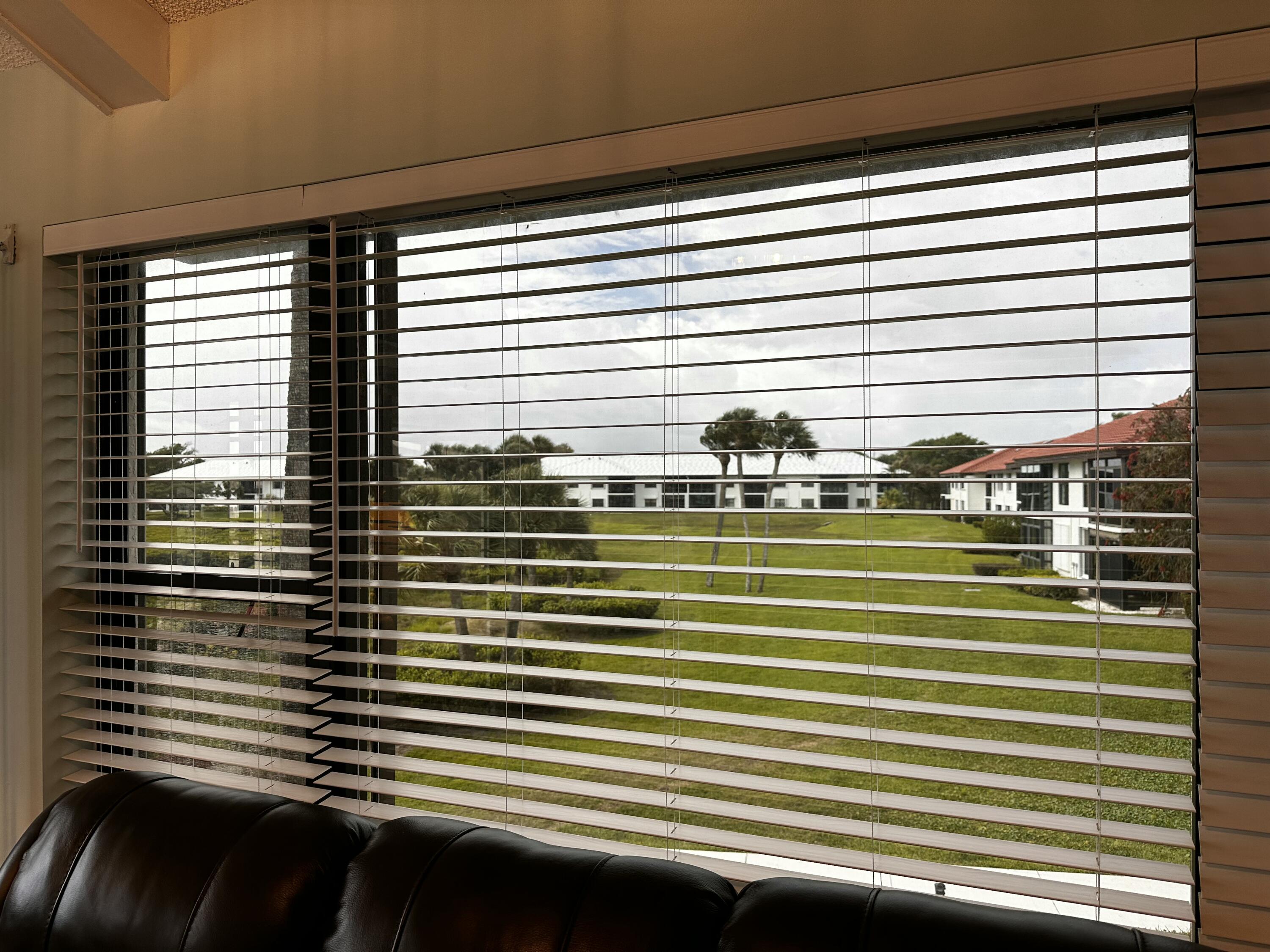 6142 Southeast Landing Way, Unit 16 Stuart, FL 34997 - Photo 31 of 73 View from Living Room End/Side Windows
