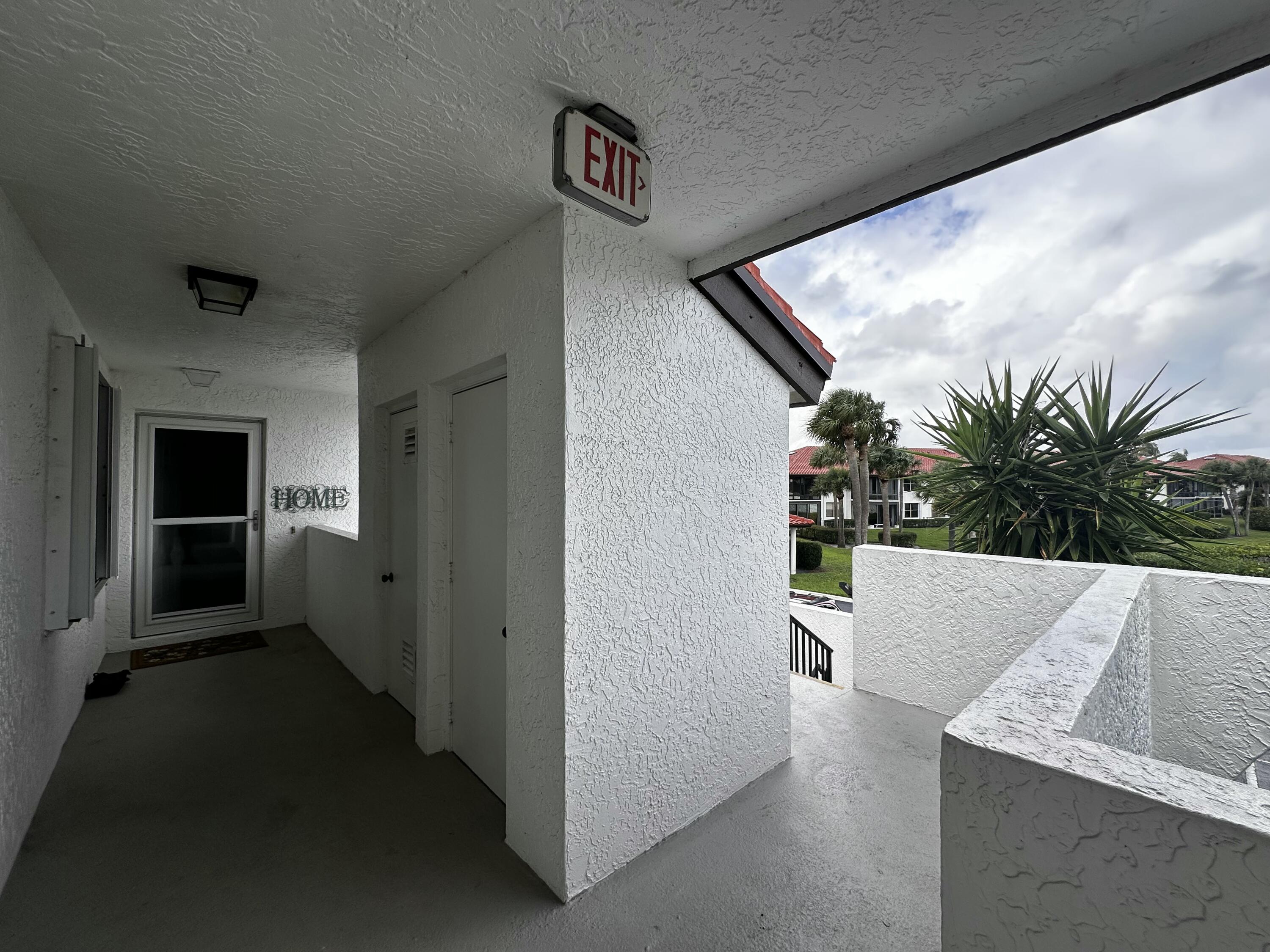6142 Southeast Landing Way, Unit 16 Stuart, FL 34997 - Photo 65 of 73 Front Door & Steps