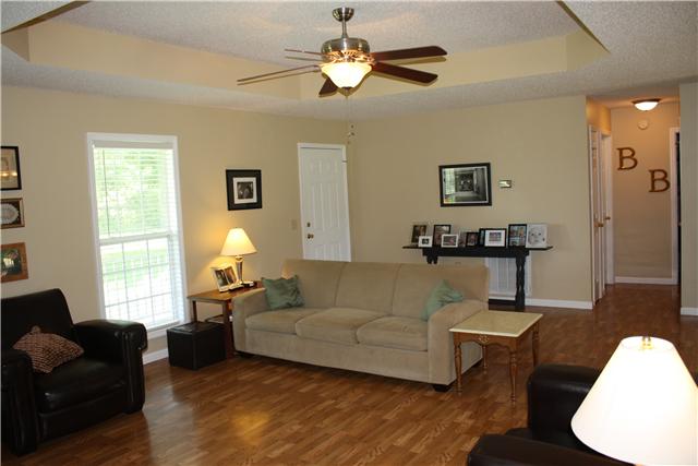 880 Barnette Road Minor Hill, TN 38473 - Photo 6 of 19 opposite view of the Living room to the Front door and hallway leading to the secondary bedrooms.