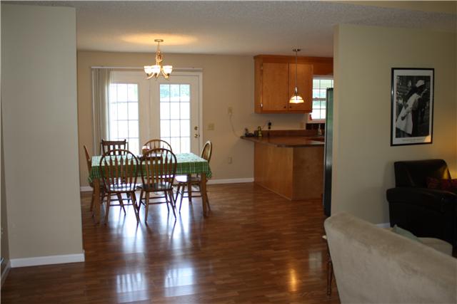 880 Barnette Road Minor Hill, TN 38473 - Photo 7 of 19 Living Room to the Eat-in area of the kitchen...French doors lead to the back deck.