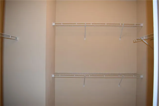 a view of small space with racks on the wall