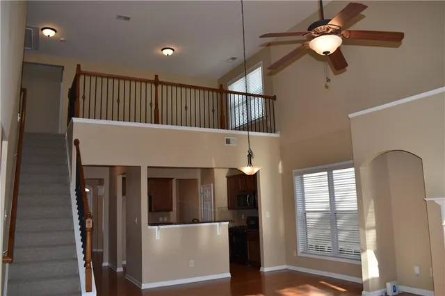 a view of entryway and hall with a window