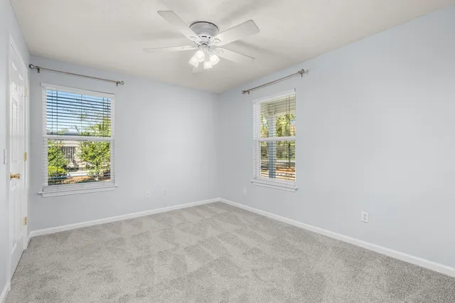 a view of a backyard with a small cabin