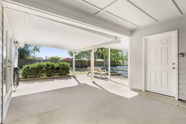 a house with a tree in the background