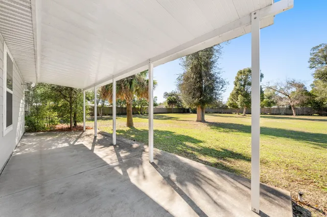 a view of swimming pool with an outdoor space and seating area