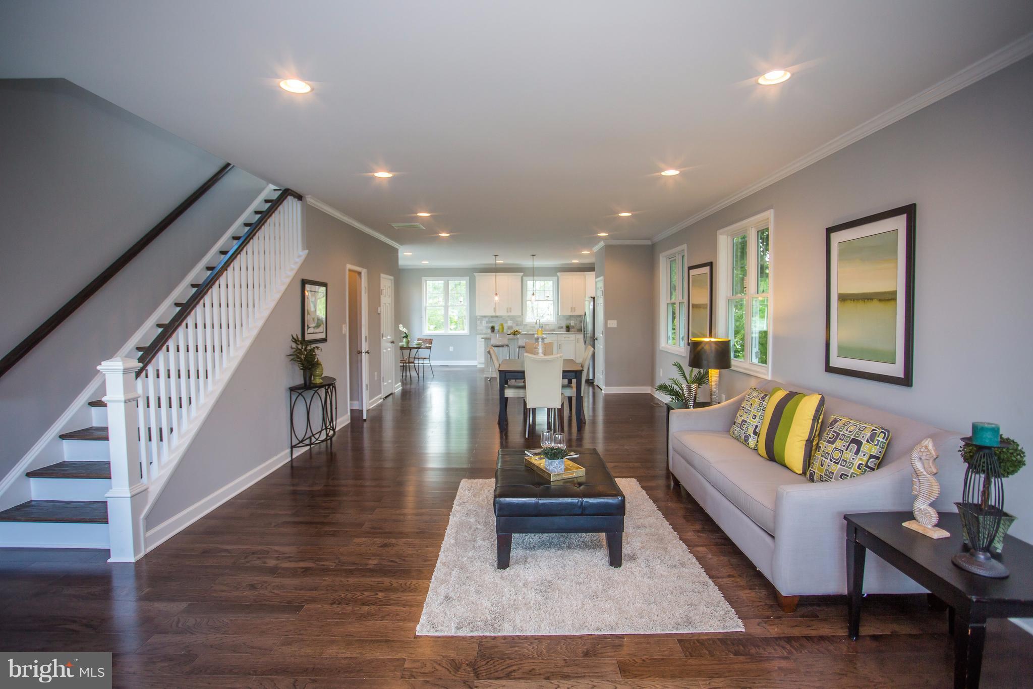 6445 First Street Alexandria, VA 22312 - Photo 11 of 28 a living room with furniture and wooden floor
