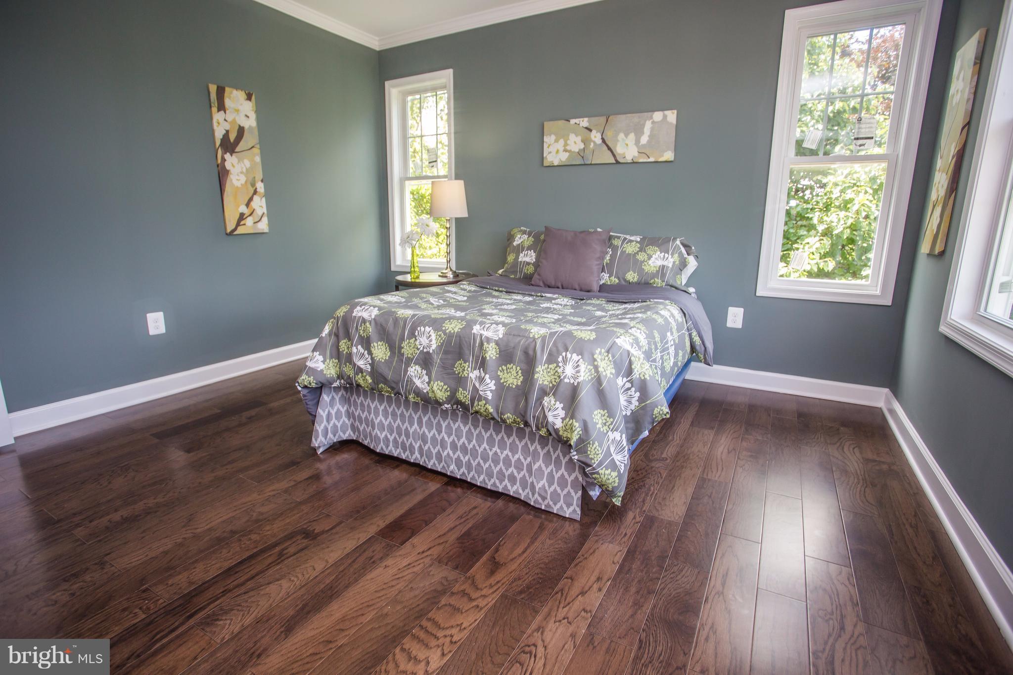 6445 First Street Alexandria, VA 22312 - Photo 19 of 28 a bedroom with a bed and window