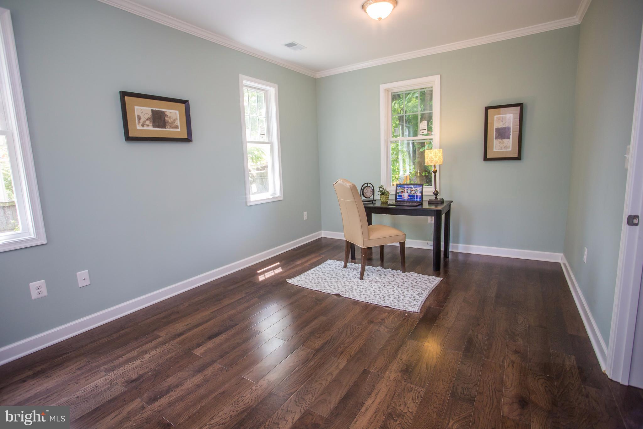 6445 First Street Alexandria, VA 22312 - Photo 20 of 28 a workspace with wooden floor