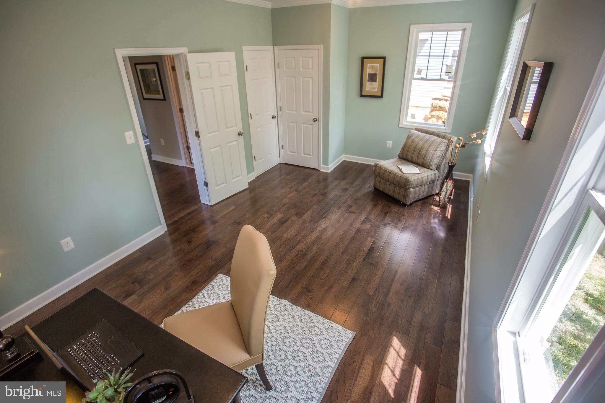 6445 First Street Alexandria, VA 22312 - Photo 21 of 28 a living room with furniture and a window