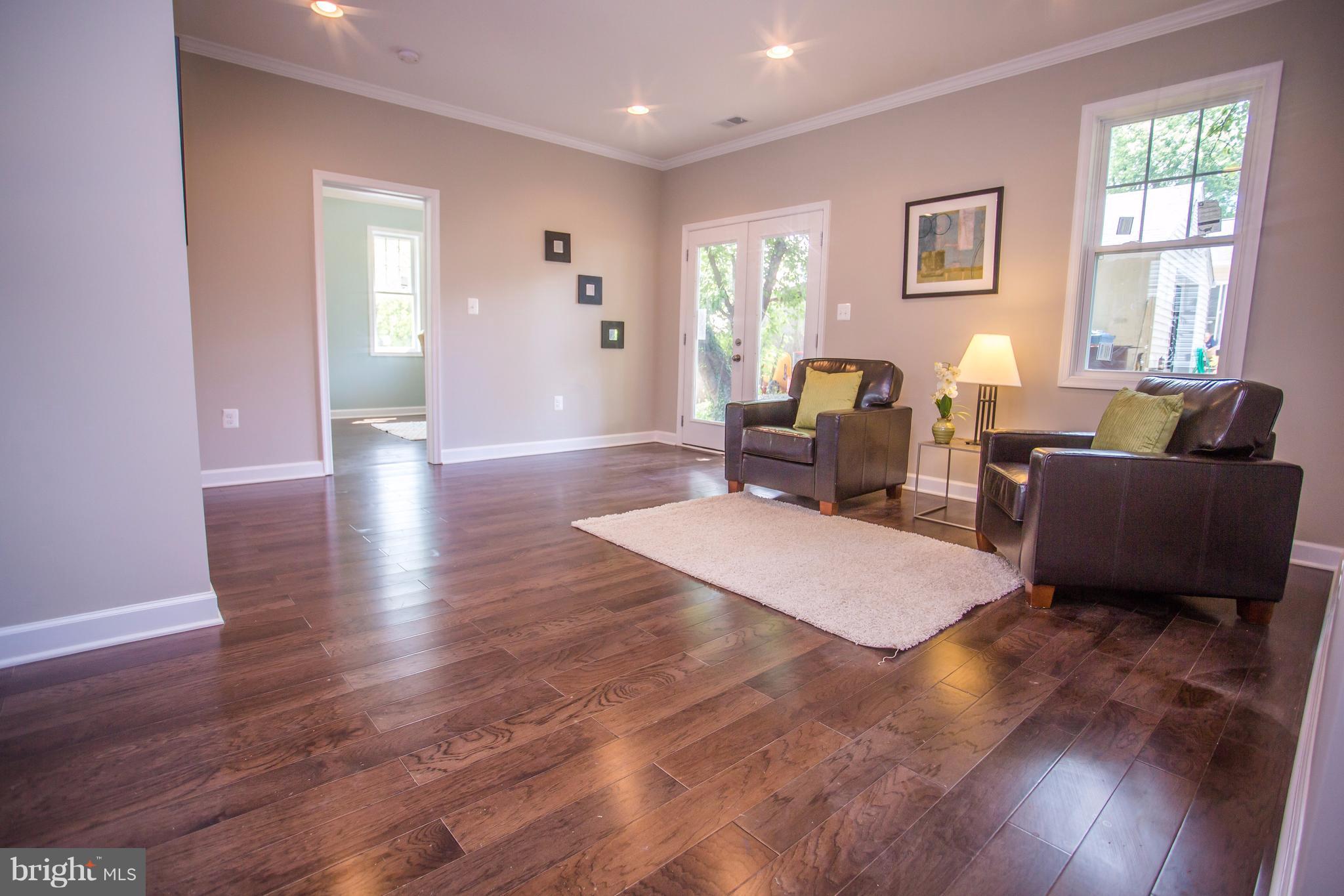 6445 First Street Alexandria, VA 22312 - Photo 22 of 28 a living room with furniture window and wooden floor
